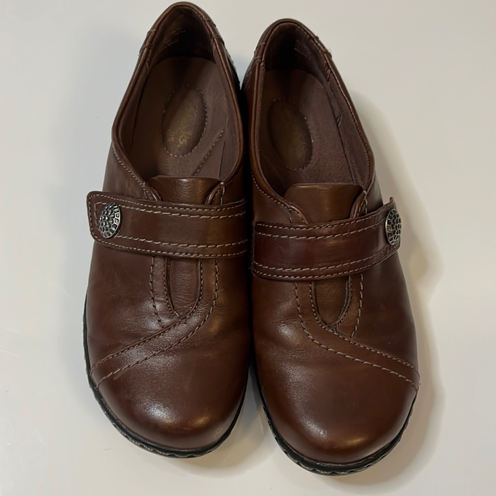 Clarks slip on mules; great condition; size 8; chocolate with silver closure